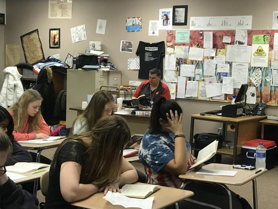 Language Arts teacher Adam Homo and his freshmen read The Glass Menagerie, on Friday, Feb. 22. Homo is encouraging students to sign up for his new Language Arts elective called Sports Literature.