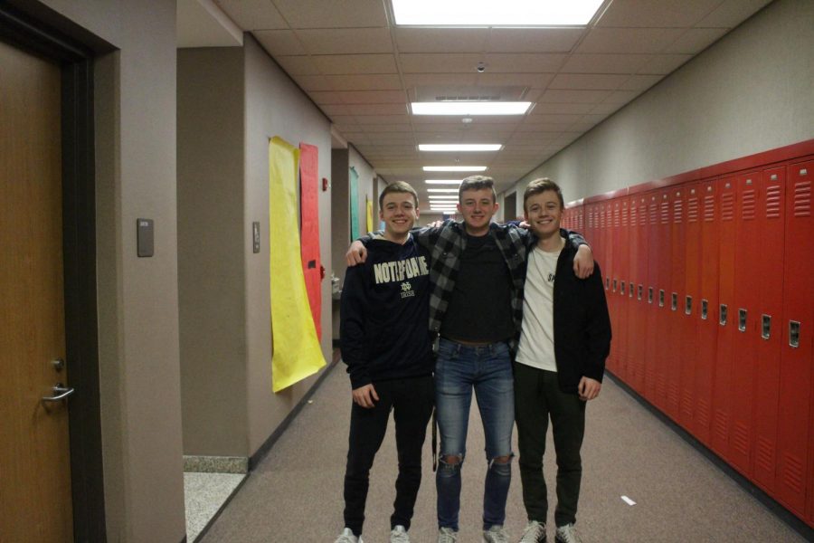 Seniors Chris (right) and Mike (left) Troyer and Junior Christian Ayers (center) in the hallway (per usual) on Wednesday, March 6. Some say we kinda look alike, but I dont know. I say Chris and I are the real twins. 