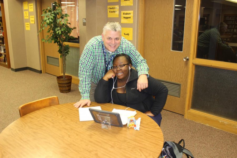 Mr. Asbury and Junior Tian Suggs in the Media Center on Wednesday, Feb. 6. 