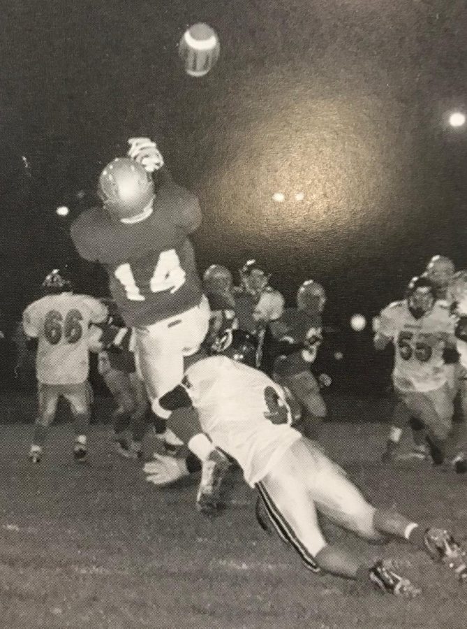 Record holding Charger wide receiver Tony Rodino goes up for a pass against the Northwood Panthers during the 2003-2004 season.  
