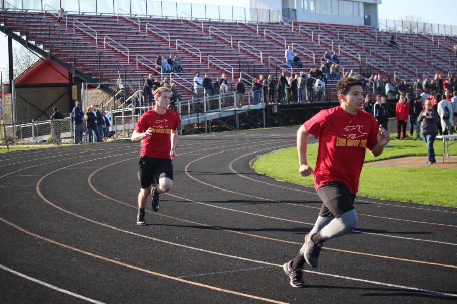 Juniors Tyler Lehner and Esvin Huerra are off during the 400m run on April 26t, 2019.
