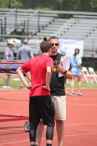 Senior Brian Ketchum talks with Coach Todd Sheely about the meet.
