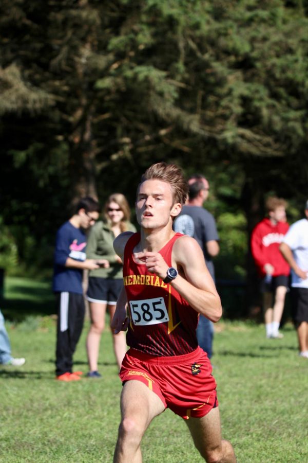 Senior Neil Terrell runs strong during the NIC Stomp on Saturday, Aug. 24. Neil placed first and the Boys Cross Country team placed third overall