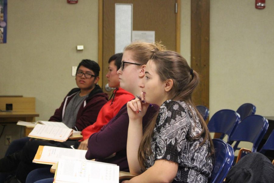 Lacy Whitmer follows along on the lecture during her AP Music Theory class on Wednesday,Oct. 30. There are only four other students along with Whitmer that take this challenging course. 