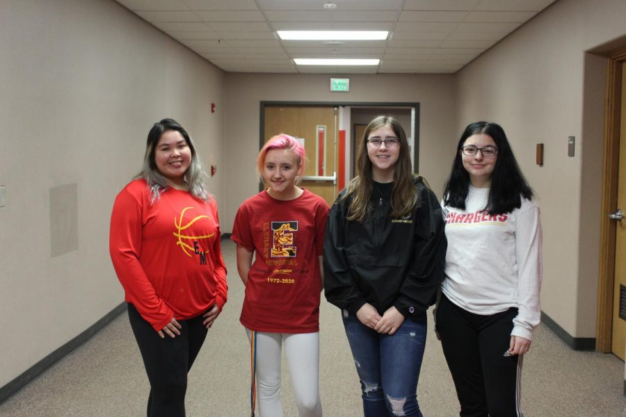 Cecilia Macedo Perez (11), Kaylee Coombs (11), Alexis King (9), Emily Cornish (10) pose together in their Charger spirit wear on Friday, Jan. 24.