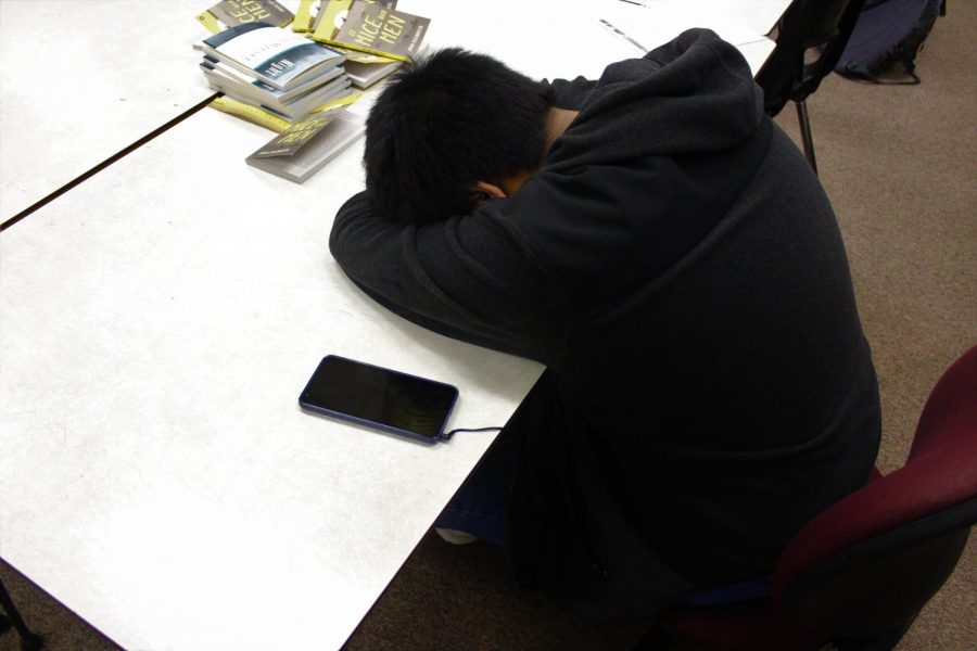 Junior Richard Bautista catches some Zs during GENESIS on Friday, Jan. 31. Sleep deprivation occurs all throughout Memorial, especially in class.   