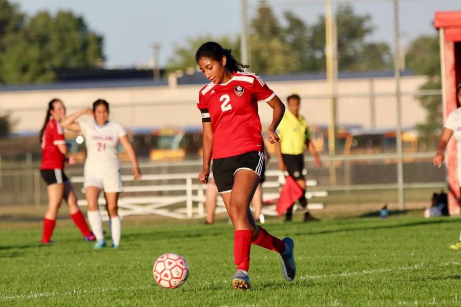 Editor-in-chief, Jahlea Douglas, heads down the soccer field on Thursday, Sept. 5, 2019. EMHS Girls soccer defeated Lakeland 4-2.