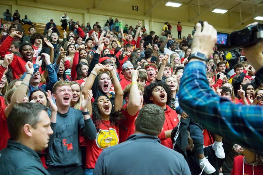 EMHS Student Section goes crazy after the basketball team takes home the Longfellow Trophy on Friday, Dec. 12, 2019. This is the last time the two school would ever face off against each other.
