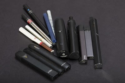 Image of different styles and types of E-cigarettes and juuls. No modifications made https://creativecommons.org/licenses/by/2.0/