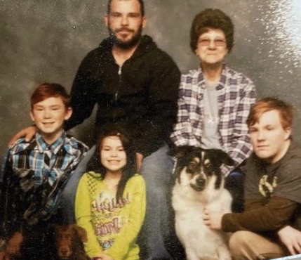 Senior, Phillip Meadows(bottom right), and his family gather together for a family picture. Phillip lives with his dad, Brian(top left) and his grandma(top right). Also pictured is his brother, Brandon(bottom left) and his sister, Amanzis(bottom middle).