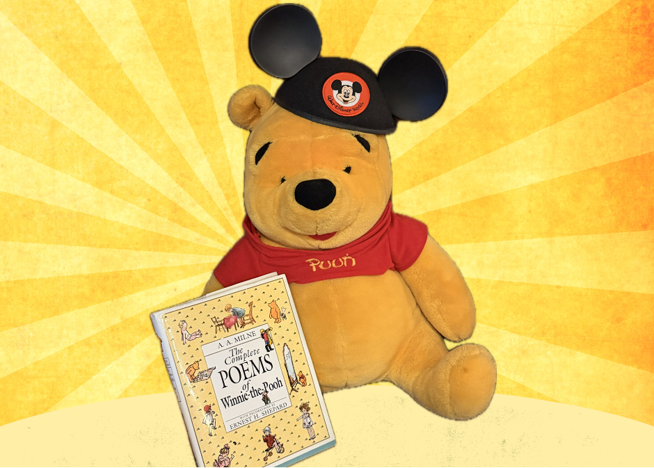 Winnie-the-Pooh wears a Mickey Mouse cap.