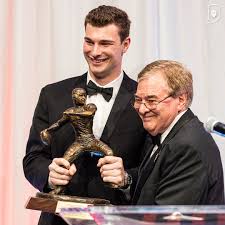 Fernando Mendoza receives the Heisman Trophy.