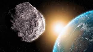 A meteor just misses the earth.